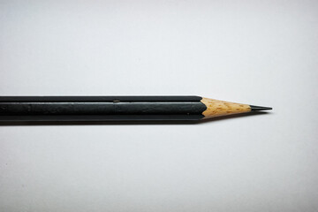 Black pencil wood on white background