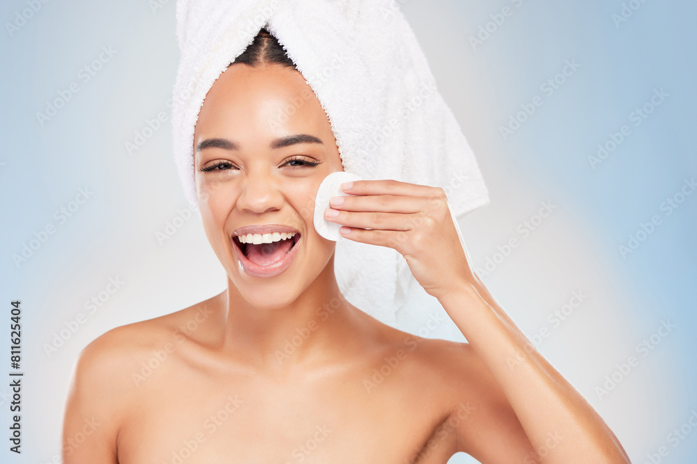 Poster Young woman, portrait and laughing with cotton cleaning face in studio background for skincare, cosmetics and beauty. Female person, dermatology or grooming fresh for wellness, hygiene and anti aging