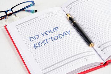 Business motivational. Do your best today symbol the inscription in the notebook