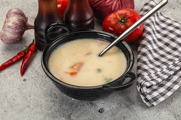 Salmon cream soup with vegetables