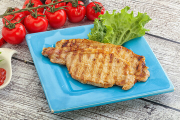 Grilled pork steak with ketchup