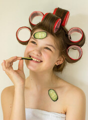 woman with curlers in her hair
