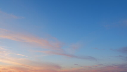 Purple pink blue sunset sky clouds. Clouds with pink, purple and dark colors at sunset sky. Wide...