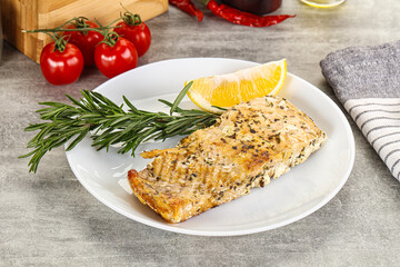 Baked salmon fish served rosemary