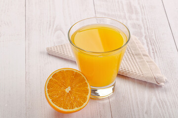 Sweet fresh orange juice in the glass