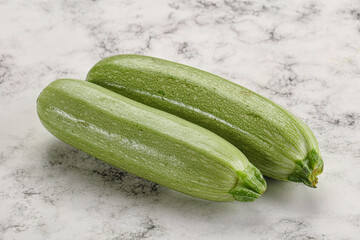 Raw green ripe zucchini vegetable