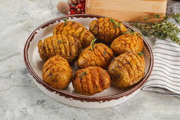 Baked baby potato with thyme