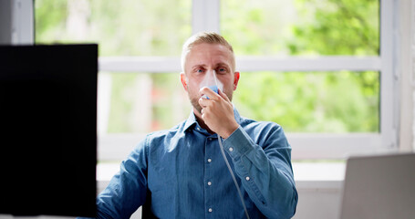 Asthma Patient Breathing Using Oxygen Mask