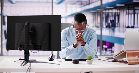 Contemplative Business Man At Desk