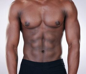 Fitness, black man and chest of bodybuilder in closeup for healthy body isolated in studio. Sports,...