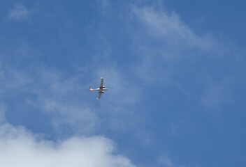  twin-engine plane against the background of clouds