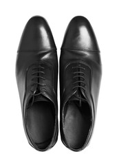A pair of black leather dress shoes against a white background, depicting elegance and sophistication