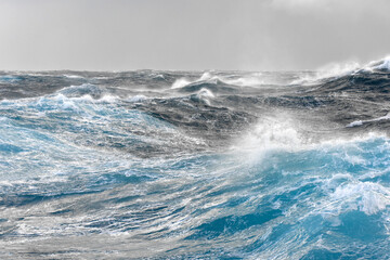 Rough seas. Waves and spray.