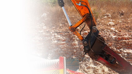 Excavator Machinery At Work Closeup Orange Color Highlight
