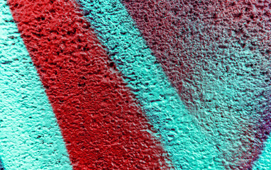 Beautiful colorful street art graffiti background. The wall is decorated with abstract drawings house paint. Modern style urban culture of street youth. Abstract picture on wall © Yaroslav