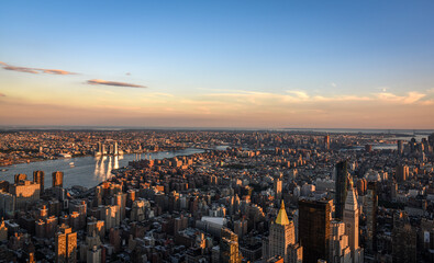 The East River, Long Island and New York City Skyline seen from the Empire State Building at Sunset