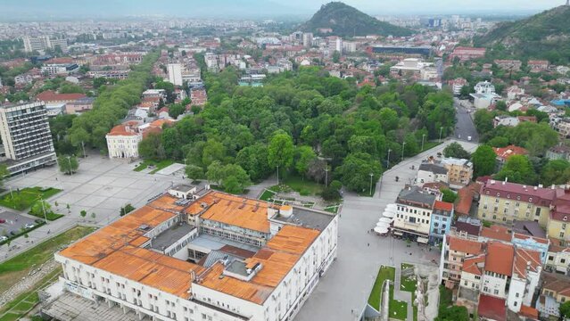 Aerial drone shot of Plovdiv city center. Ancient city in Bulgaria seen from above during a cloudy morning. Flyover footage of the Touristing city of Philippopolis in Thracia. Old Town. Tepe visible
