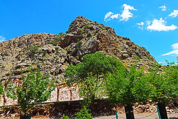 Mountains, grass, blue sky, valley and scattered clouds, nature in Sulaymaniyah , iraq