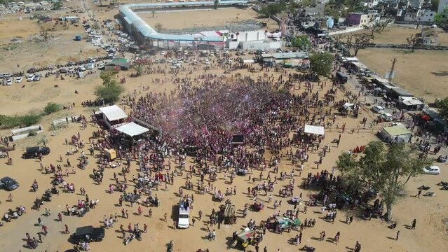 Aerial Drone shot of people of pushkar playing holi
