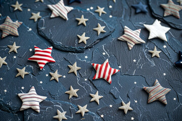 Fototapeta premium Memorial Day honor captured with Stars and Stripes on slate blue.