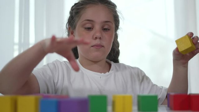 Kindergarten child with constructor set engaged educational. playtime builder with colorful blocks. Child development through play constructor fun kindergarten. child kindergarten constructor blocks.