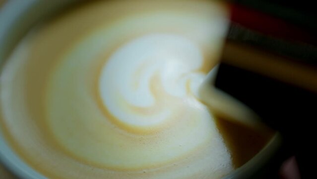 barista make coffee latte art with coffee espresso machine in coffee shop 