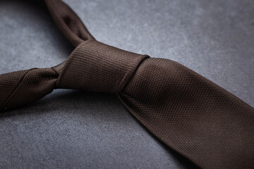 men's tie on a dark background.