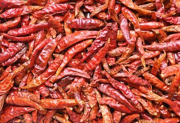 Dried red chili pepper  isolated on white background. Top view.