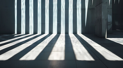 person >'s shadow casts on the floor of a building, with a white wall in the background - Powered by Adobe