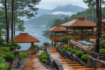 Wet wooden path leading towards cabins by the mountains