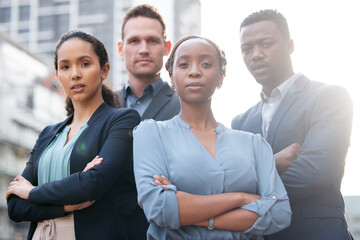 Portrait, outdoor and serious people for business with teamwork, lens flare and cooperation with solidarity. Corporate staff, crossed arms and partnership in city with collaboration and group support