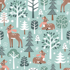 Seamless vector pattern with cute hand drawn fawn, winter trees and snowflakes. Perfect for textile, wallpaper or nursery print design.