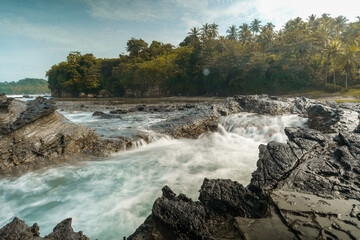 seascape is very beautiful with coral rocks and sea water that looks very soft like cotton. slow shutter speed effect