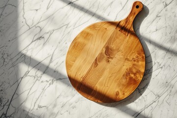 A wooden cutting board sits on a marble countertop