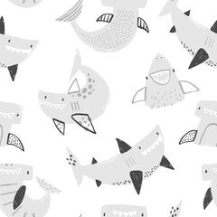 Vector seamless pattern with cute sharks on white background. Funny smiling sharks. Sea, ocean, sea inhabitants. Children's texture with sharks. Funny animals sketch.