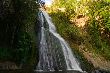 Nebiler Waterfall and Aglayan Cave, located in Dikili, Izmir, Turkey, is a tourist destination with a walking track and picnic area.