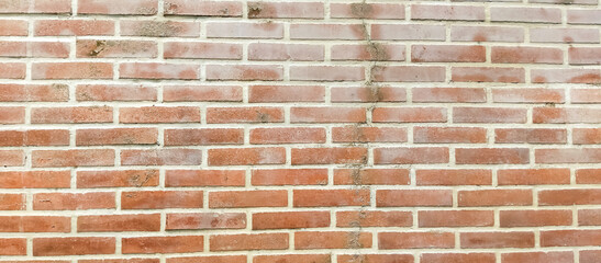 The red brick wall of the old house