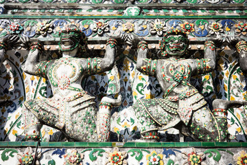 Wat Arun god figures old texture antique in Bangkok, Thailand