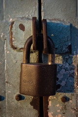 old rusty padlock on the door dirty high-resolution lock key