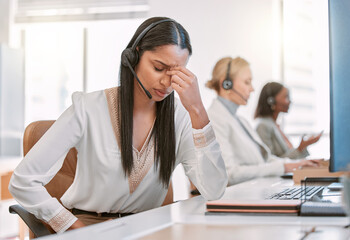 Call center, stress or headache by woman in office consulting in customer service, crm or faq with...