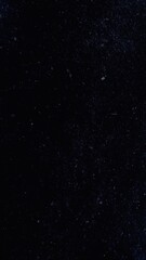 Dark space above the earth filled with stars
