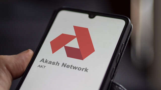 Close up on logo of (AKT) Akash Network on the screen of an exchange. (AKT) Akash Network price stocks, $AKT on a device.