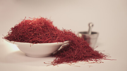Organic Red Saffron Spice with silver mortar