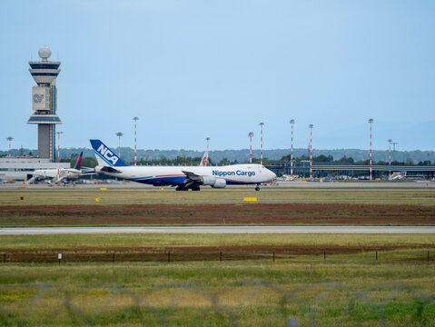 NCA Nippon Cargo Airlines Boeing 747 is taxiing at MXP Milano Malpensa international airport