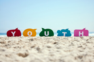 Beach, sand and letters in speech bubble in summer for communication, text or message delivery....