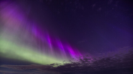 Northern Lights (Aurora Borealis) lighting up the sky on a beautiful spring night west of Ottawa, Canada