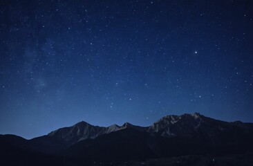 Starry sky against the background of mountains, dark sky
