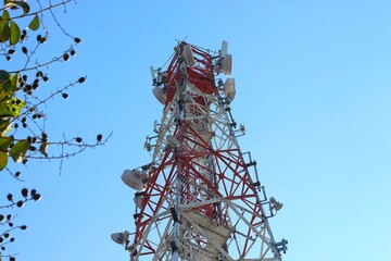 Telecommunication tower in the background and blue sky or cloud