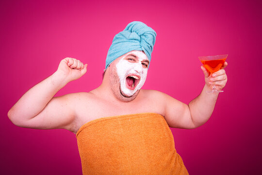 Early morning and preparation for the party. Funny fat man after a shower.