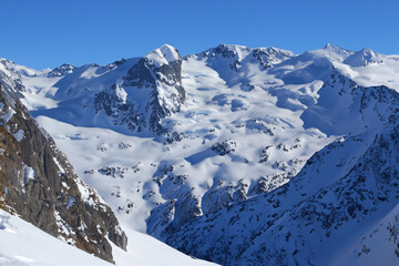 snowy mountains. large snowy mountains against blue sky, nature concept